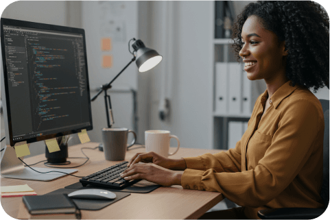 Woman coding on computer